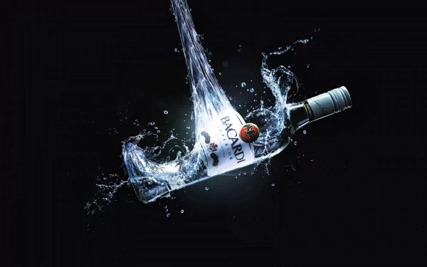 HD desktop wallpaper featuring a Bacardi bottle submerged in dynamic water splash against a dark background, highlighting man-made design elements.
