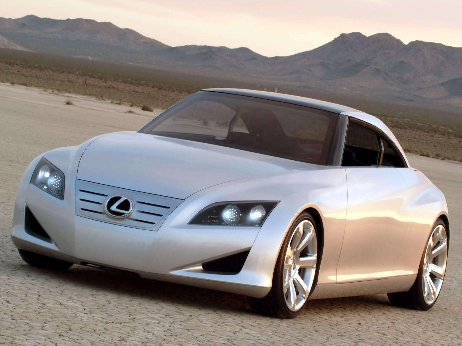 Sleek silver Lexus concept sports coupe on a desert plain at dusk, HD PC desktop wallpaper background.