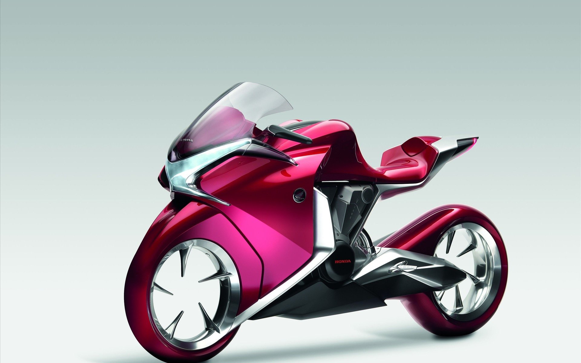 HD PC desktop wallpaper featuring a sleek, futuristic Honda vehicle with a streamlined design in glossy red and silver tones.