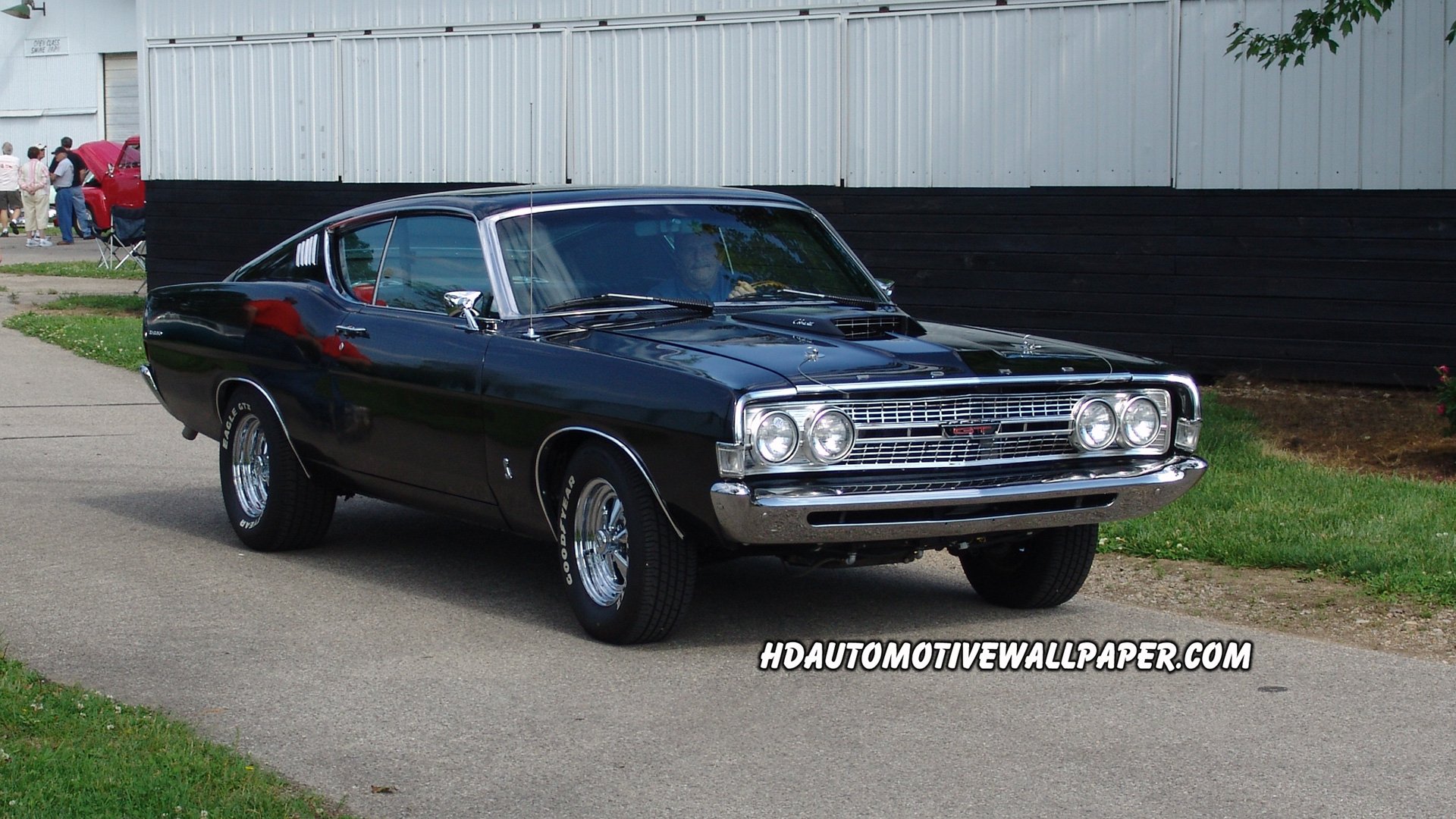 1968 Ford Torino GT in black, showcased as an HD PC desktop wallpaper and background, highlighting its classic muscle car design and polished chrome details.