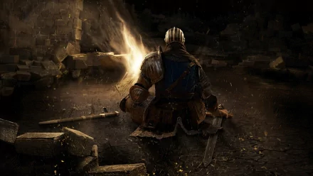A Dark Souls HD desktop wallpaper featuring a knight sitting by a bonfire amidst a dark, ruined setting.