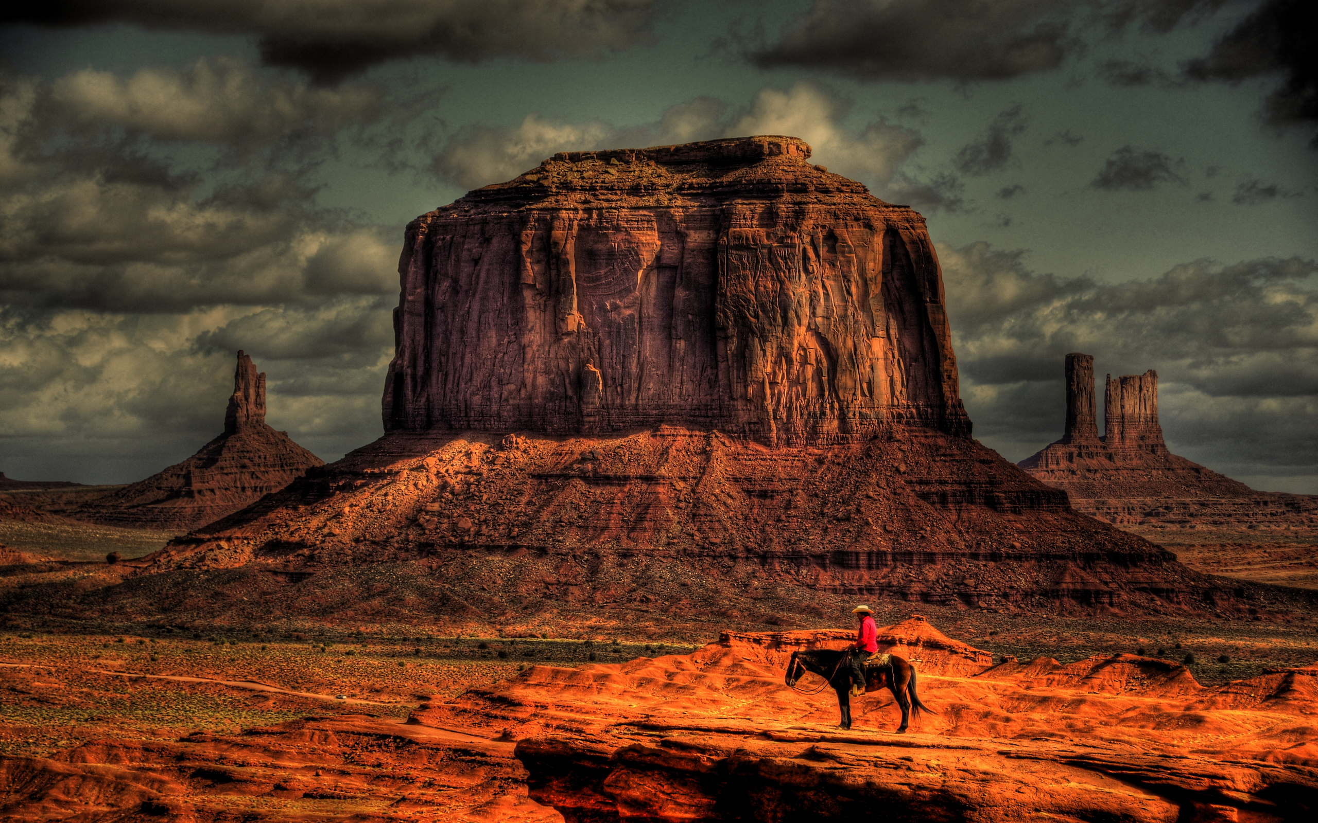 John Ford's Point, Monument Valley scene featuring a majestic horse in nature.