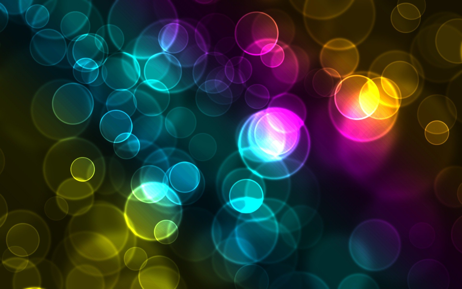HD PC desktop wallpaper featuring an abstract array of colorful rainbow light dots creating a vibrant, glowing bokeh effect.