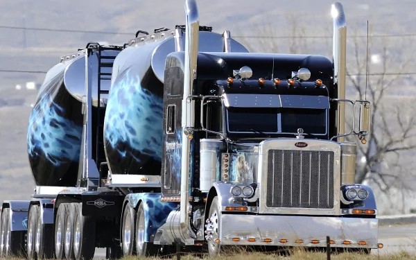 A striking HD desktop wallpaper featuring a sleek truck with intricate designs, showcasing its powerful presence and impressive detailing against a scenic background.