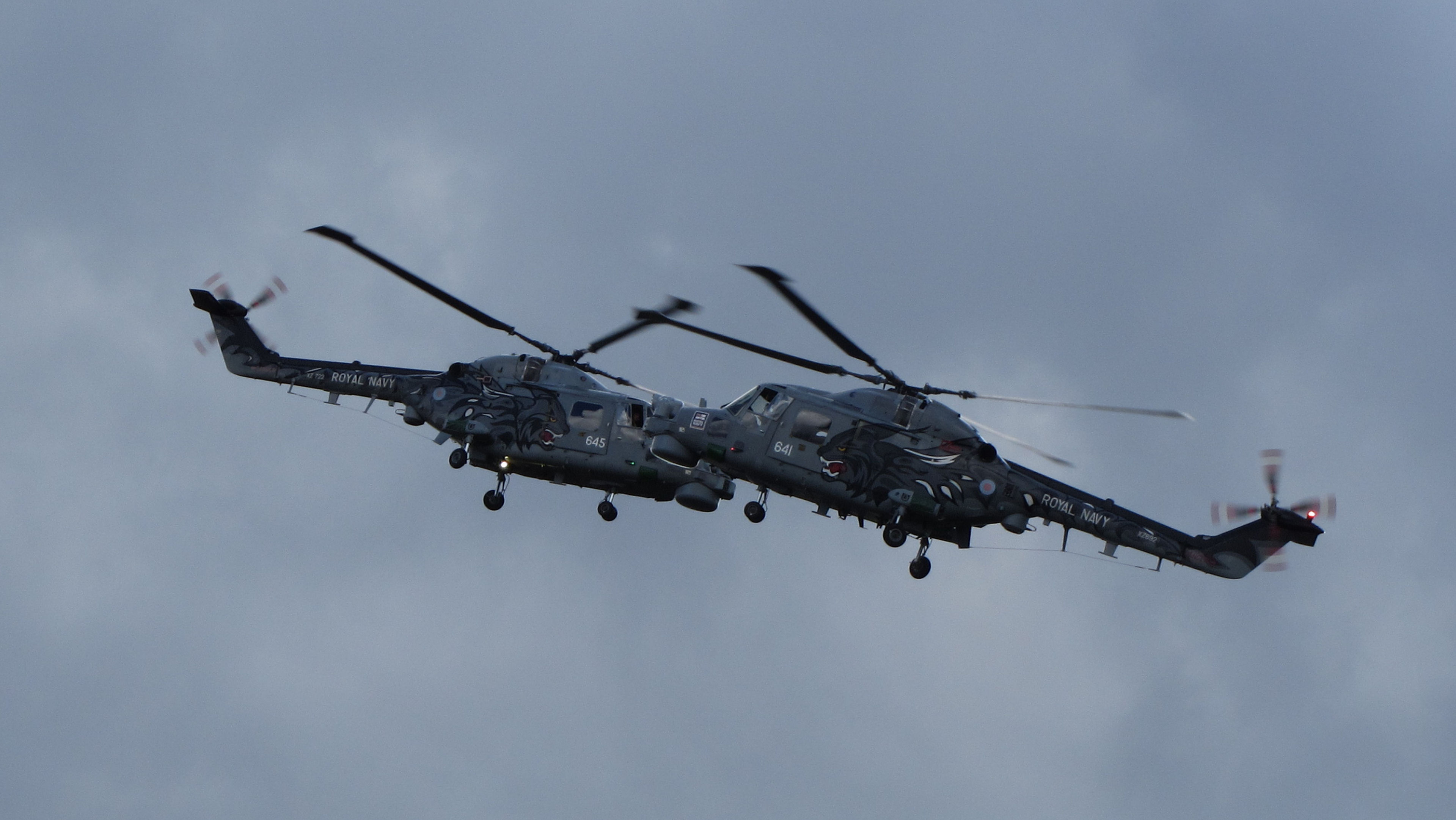 Military helicopter flying in the sky, showcasing the powerful Westland Lynx.