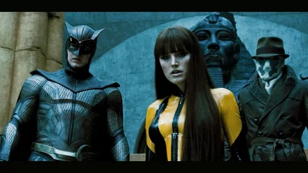 HD PC desktop wallpaper featuring characters from the movie Watchmen, showcasing Night Owl, Silk Spectre II, and Rorschach in a dramatic setting.