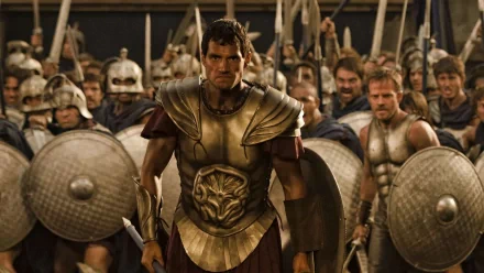 HD PC desktop wallpaper/background: bronze-armored warrior stands at the front of a shielded army in a dramatic battle scene from the movie Immortals.
