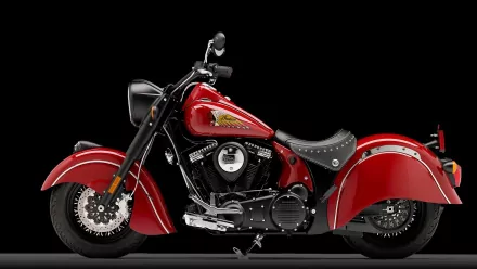 HD PC desktop wallpaper featuring a red Indian Chief motorcycle with classic design elements on a black background.