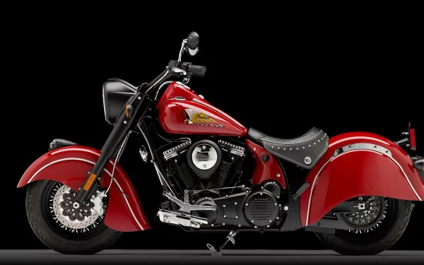 HD PC desktop wallpaper featuring a red Indian Chief motorcycle with classic design elements on a black background.