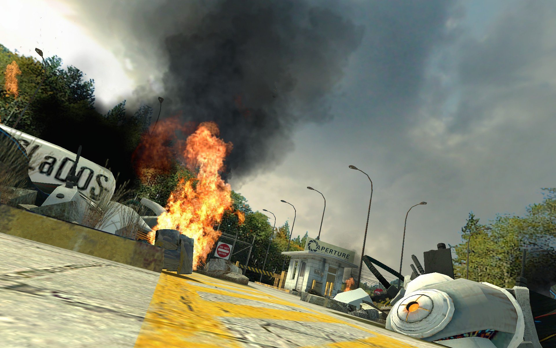 A dramatic scene from the game Portal, featuring fiery explosions, dark smoke, and a glimpse of a destroyed facility, serving as an alluring HD desktop wallpaper and background.