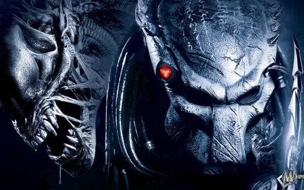 HD PC desktop wallpaper featuring close-up faces of Alien and Predator from the movie Aliens vs. Predator: Requiem with dark, intense tones.