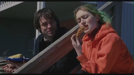 HD desktop wallpaper featuring Kate Winslet and Jim Carrey in a scene from the movie Eternal Sunshine of the Spotless Mind.