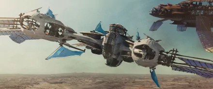 HD PC desktop wallpaper and background from the movie John Carter: a large airship with blue sails flying over a desert plain under a pale sky.