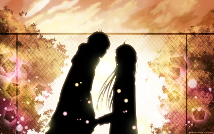 A beautiful HD desktop wallpaper featuring Sawako Kuronuma and Shota Kazehaya from the anime Kimi Ni Todoke, silhouetted against a vibrant, glowing backdrop.