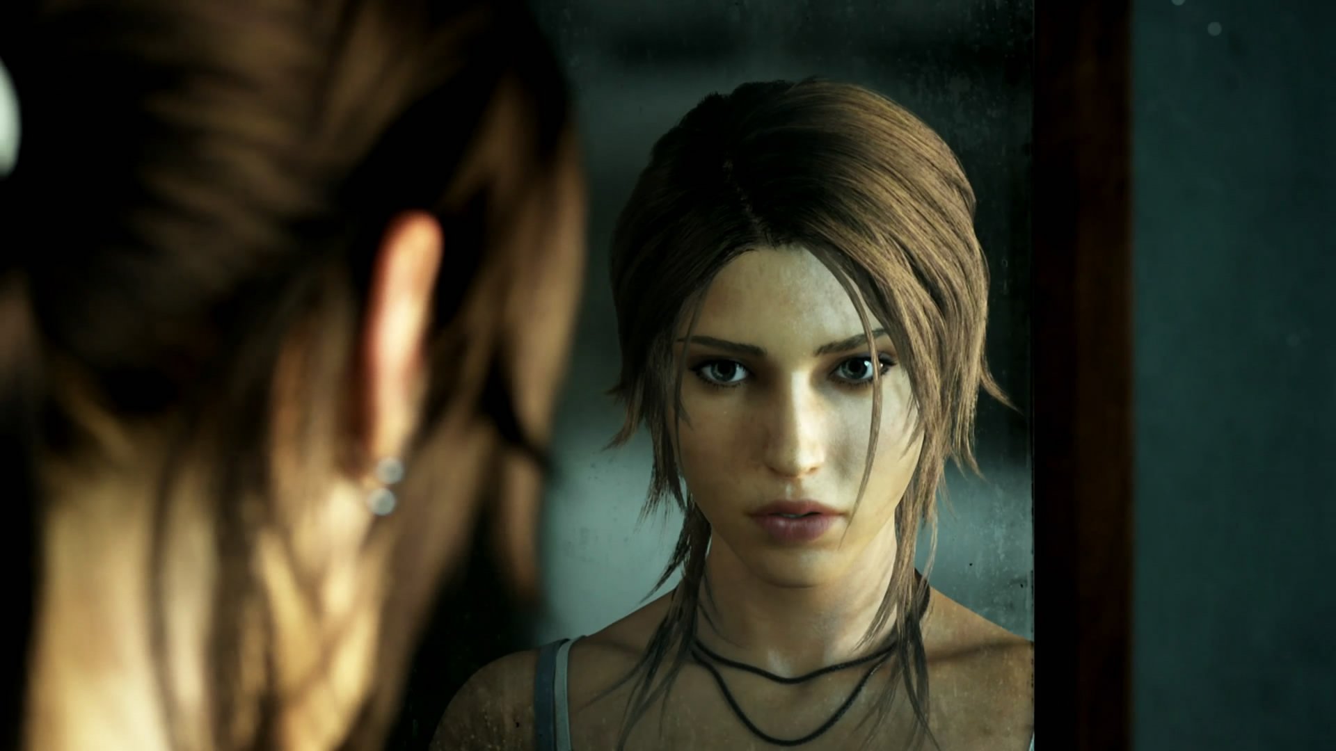HD desktop wallpaper featuring a close-up of a female character from Tomb Raider, reflecting in a mirror with an intense expression, capturing the game's adventurous spirit.
