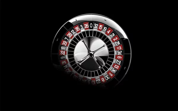A sleek casino roulette wheel dominates this HD PC wallpaper, set against a dark background, capturing the thrill of gaming and entertainment.