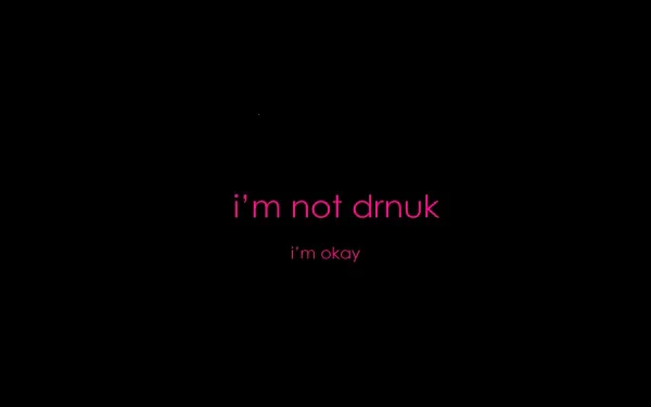 HD PC desktop wallpaper featuring a minimalistic quote in pink text on a black background: i'm not drnuk, i'm okay.