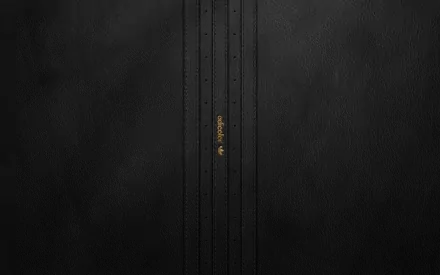 A sleek HD desktop wallpaper featuring a textured black background with subtle vertical stripes and an Adidas logo, embodying a modern, minimalist aesthetic.