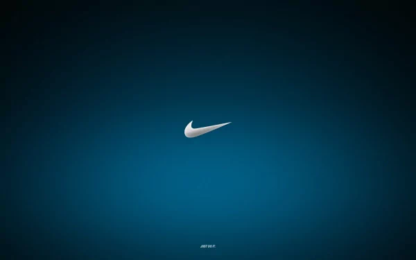 A sleek HD desktop wallpaper featuring the iconic Nike Swoosh logo against a deep blue background, showcasing modern design and style.