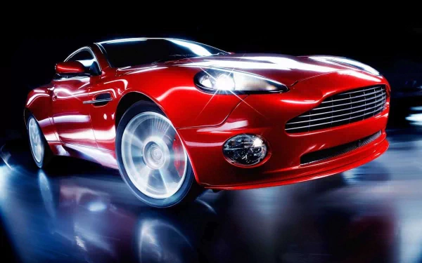 HD PC desktop wallpaper showcasing a sleek red Aston Martin vehicle with dynamic lighting and reflections against a dark background.