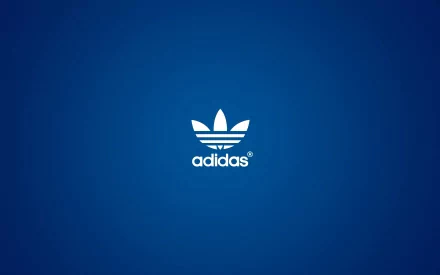 HD desktop wallpaper featuring a sleek blue background with the iconic white Adidas logo prominently displayed. A stylish addition to your digital workspace.