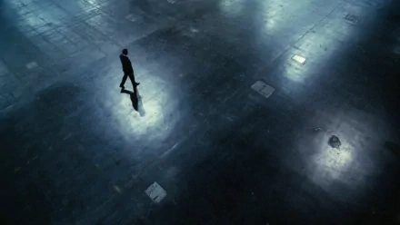 A solitary man stands reflecting alone in a dark, expansive space, evoking themes of solitude and introspection in this HD PC desktop wallpaper.