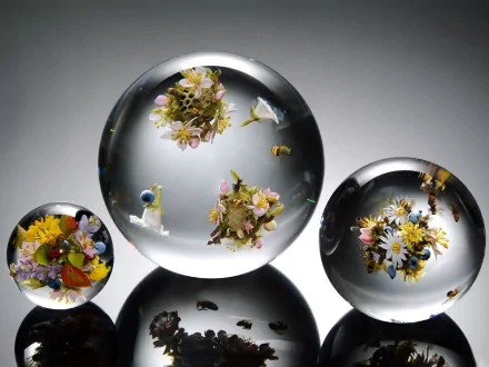 Artistic 3D art featuring floating, flower-filled glass spheres with intricate details, captured in HD quality as a striking PC desktop wallpaper and background.