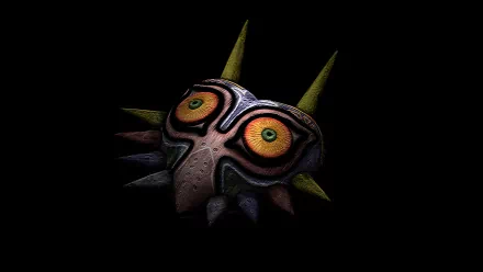 HD wallpaper featuring Majora's Mask from the video game The Legend of Zelda: Majora's Mask, showcasing the eerie, vibrant design against a dark background.