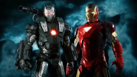 A dynamic HD wallpaper featuring Iron Man and War Machine from the movie Iron Man 2, set against a dramatic, smoky background. An impressive display of superhero action.