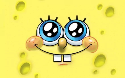 HD desktop wallpaper featuring the cheerful face of SpongeBob SquarePants from the TV show. Bright yellow background with SpongeBob's blue eyes and characteristic smile.