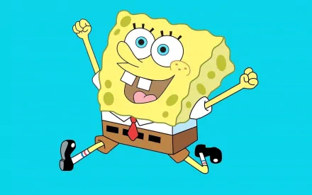 A vibrant HD desktop wallpaper featuring SpongeBob SquarePants joyfully jumping against a bright blue background, embodying the fun spirit of the beloved TV show.