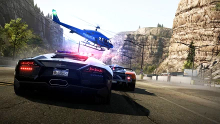 An action-packed HD wallpaper from Need For Speed: Hot Pursuit, featuring sleek sports cars and a police helicopter, set against a dramatic rocky landscape.