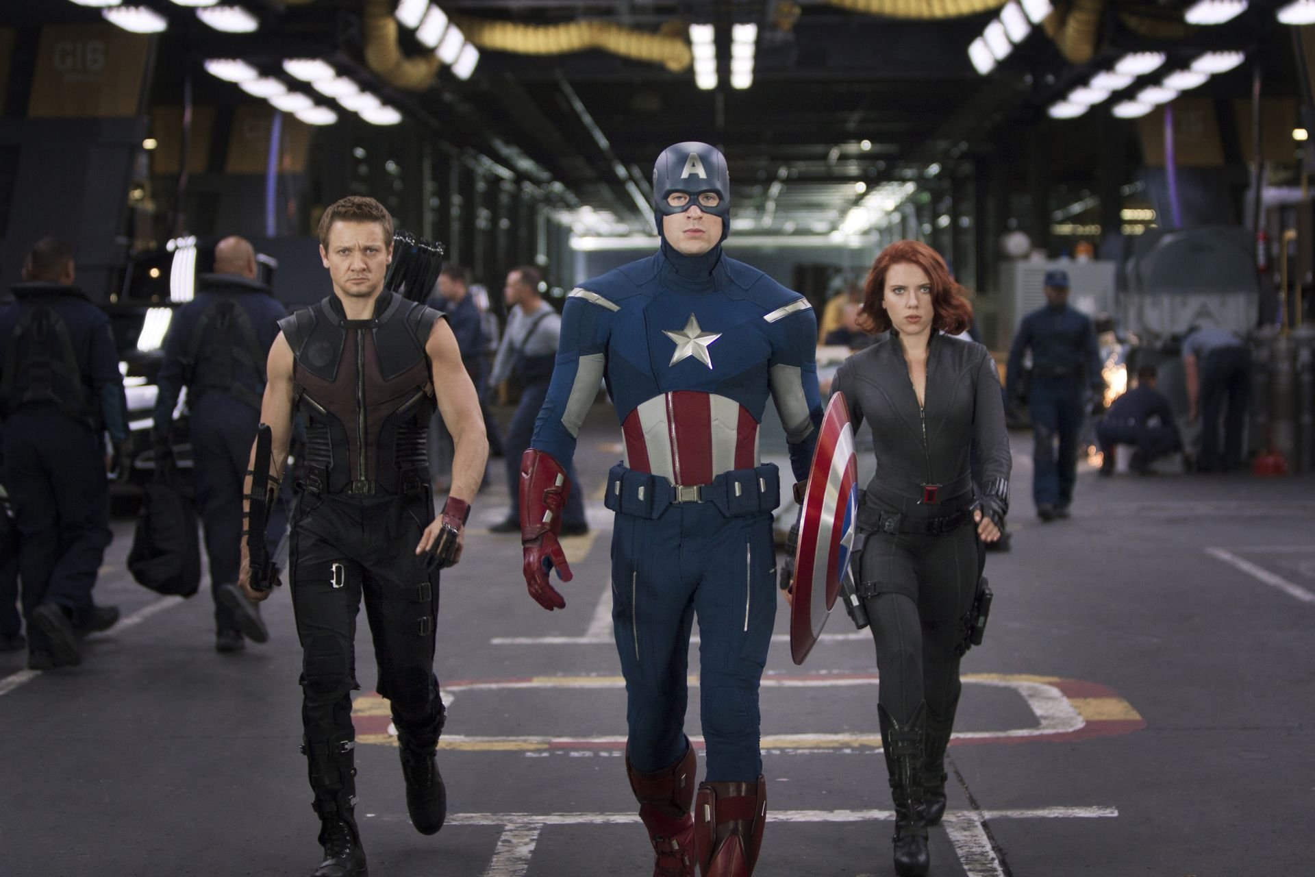HD PC wallpaper featuring Avengers characters Black Widow, Captain America, and Hawkeye, portrayed by Scarlett Johansson, Chris Evans, and Jeremy Renner in the movie scene.
