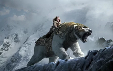 HD PC desktop wallpaper featuring a scene from the movie The Golden Compass with a girl riding a armored polar bear against a snowy, mountainous backdrop.