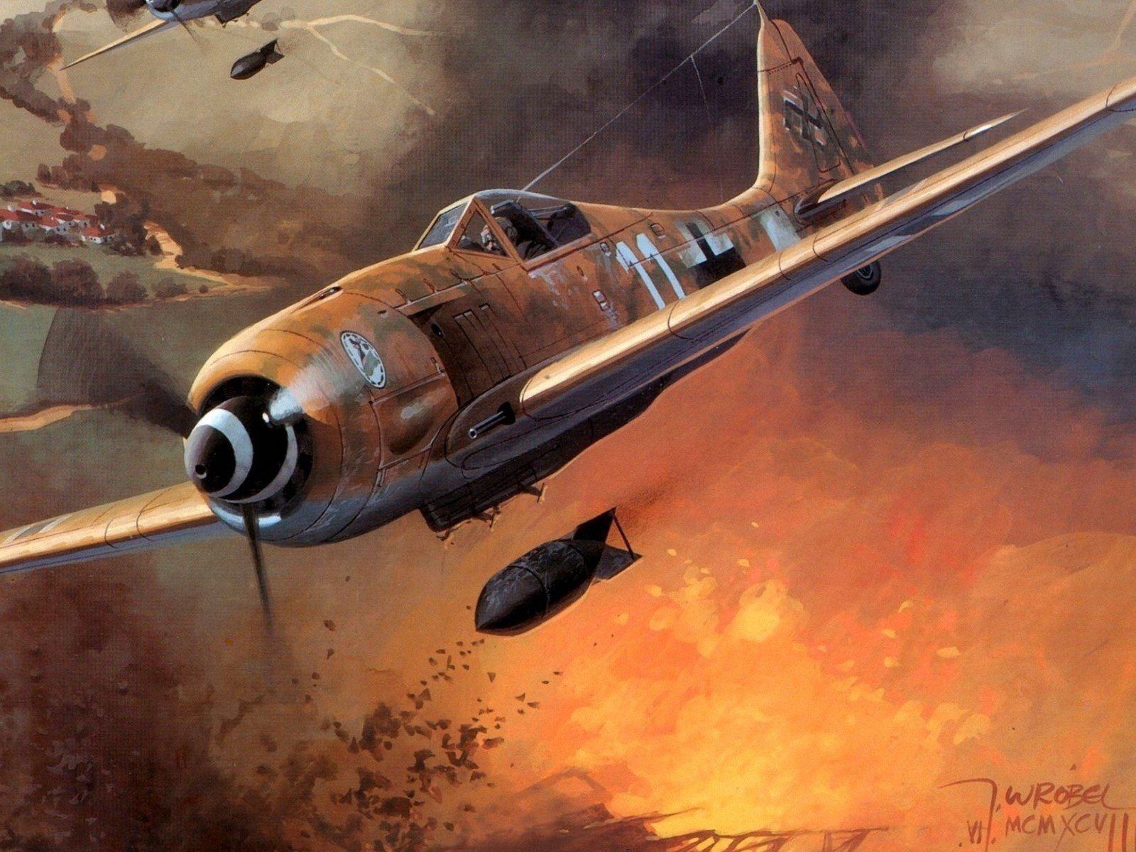 HD PC desktop wallpaper showing a military Focke-Wulf Fw 190 fighter-bomber diving over a fiery battlefield, releasing a bomb amid dramatic clouds and smoke.