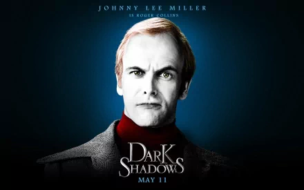 HD PC desktop wallpaper and background for the movie Dark Shadows: pale, stern man in a dark coat against a blue-black backdrop, with the film title and release date.