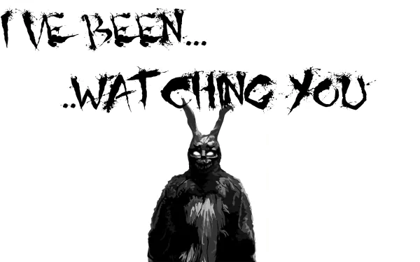 HD desktop wallpaper for the movie Donnie Darko featuring a dark, eerie figure with bunny ears and the text I'VE BEEN... WATCHING YOU.