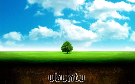A vibrant HD desktop wallpaper featuring a solitary tree on a lush green field under a bright blue sky, showcasing the Ubuntu logo at the bottom.