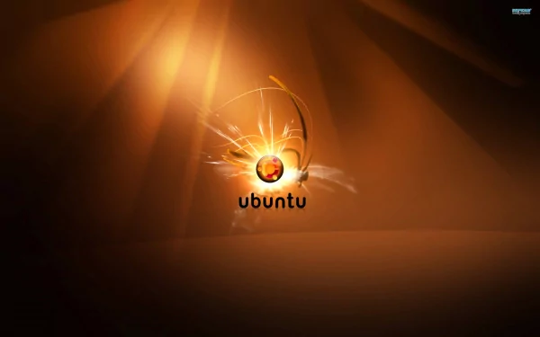 HD PC desktop wallpaper featuring a glowing Ubuntu logo with dynamic light streaks on a warm, orange-toned background, highlighting technology and Ubuntu branding.
