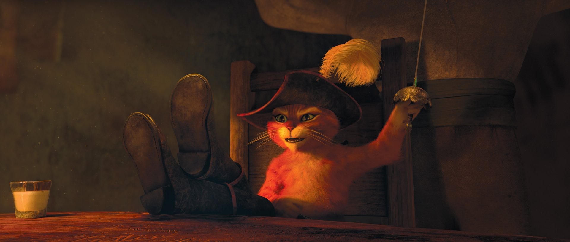 HD desktop wallpaper and background featuring Puss in Boots from the movie Puss in Boots, sitting with his feet up and holding a sword.