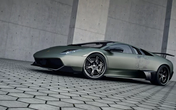A sleek Lamborghini Murcielago parked on a modern tiled surface, showcasing its striking design and powerful stance in a high-definition wallpaper format.