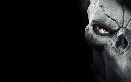 A striking HD wallpaper from Darksiders II, featuring a close-up of a menacing skull with an intense eye, set against a dark backdrop, capturing the game's ominous atmosphere.
