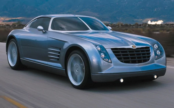 A sleek silver Chrysler vehicle driving on a road, captured in an HD PC desktop wallpaper and background.
