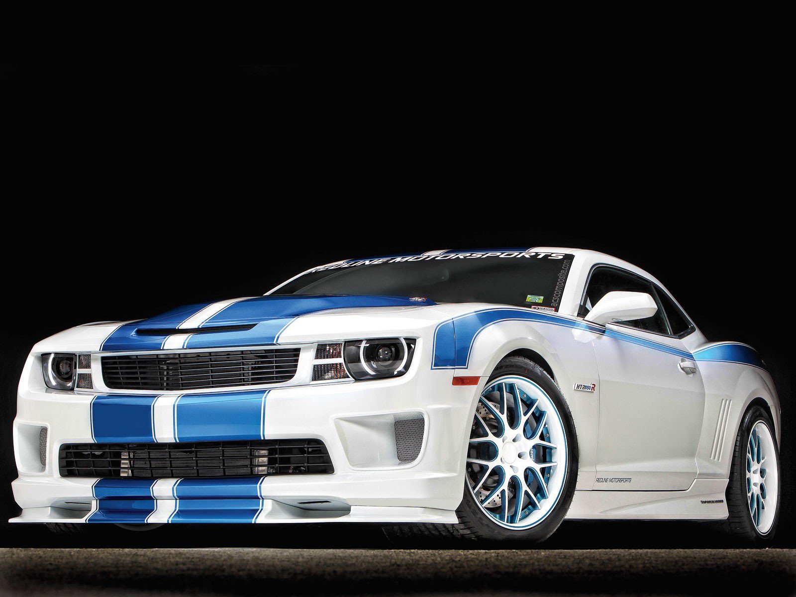 HD PC desktop wallpaper featuring a white Chevrolet Camaro with blue racing stripes against a black background.