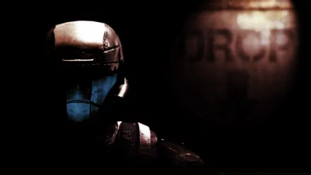 A dark and atmospheric HD desktop wallpaper featuring a soldier from Halo 3: ODST, emphasizing the character's intense gaze against a backdrop with the word DROP.