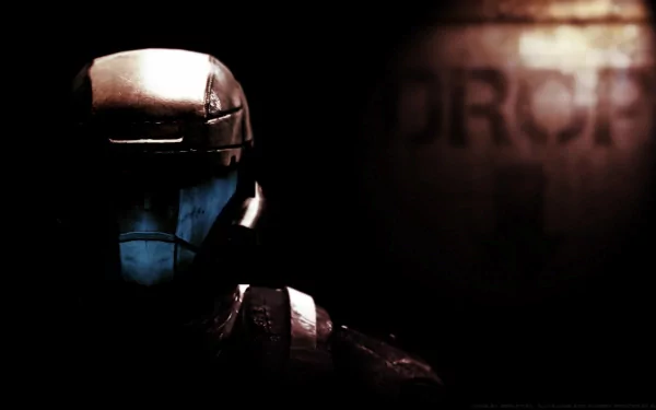 A dark and atmospheric HD desktop wallpaper featuring a soldier from Halo 3: ODST, emphasizing the character's intense gaze against a backdrop with the word DROP.