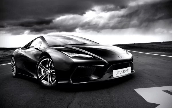 Black Lotus sports car on empty tarmac beneath dramatic clouds — HD PC desktop wallpaper and background showcasing a sleek performance vehicle.