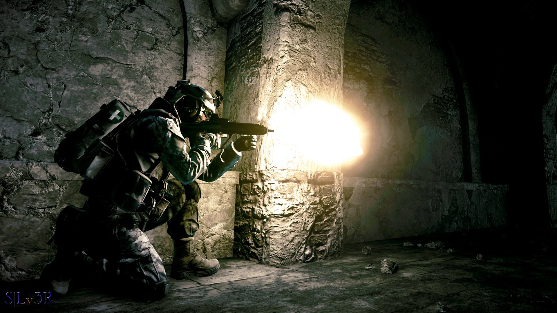 HD PC desktop wallpaper/background: Battlefield 3 video game war scene — soldier kneeling and firing a rifle inside a ruined stone building, muzzle flash lighting the dark battlefield.