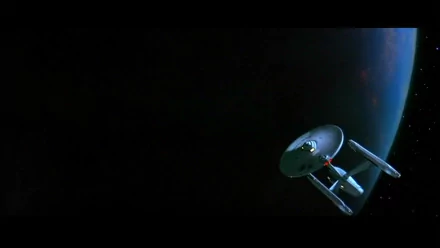 A stunning HD wallpaper featuring the USS Enterprise from *Star Trek III: The Search for Spock*, set against the backdrop of space with a distant planet.