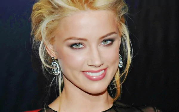 HD wallpaper featuring actress Amber Heard, showcasing her smiling with striking earrings and a stylish outfit against a dark backdrop.